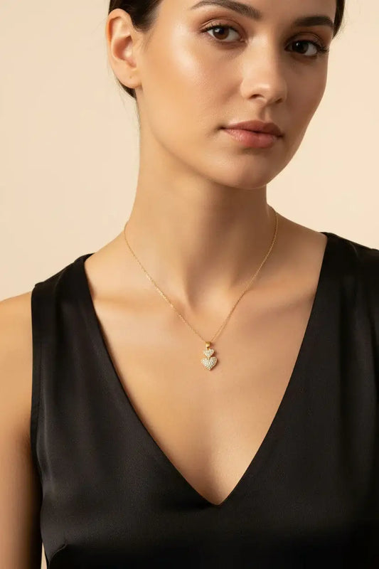 Elegant gold heart pendant necklace with sparkling stones, minimalist Korean-inspired jewelry for women