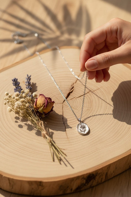 Ownline Galleria sterling silver oval pendant necklace with rose engraving, delicate chain, polished finish.